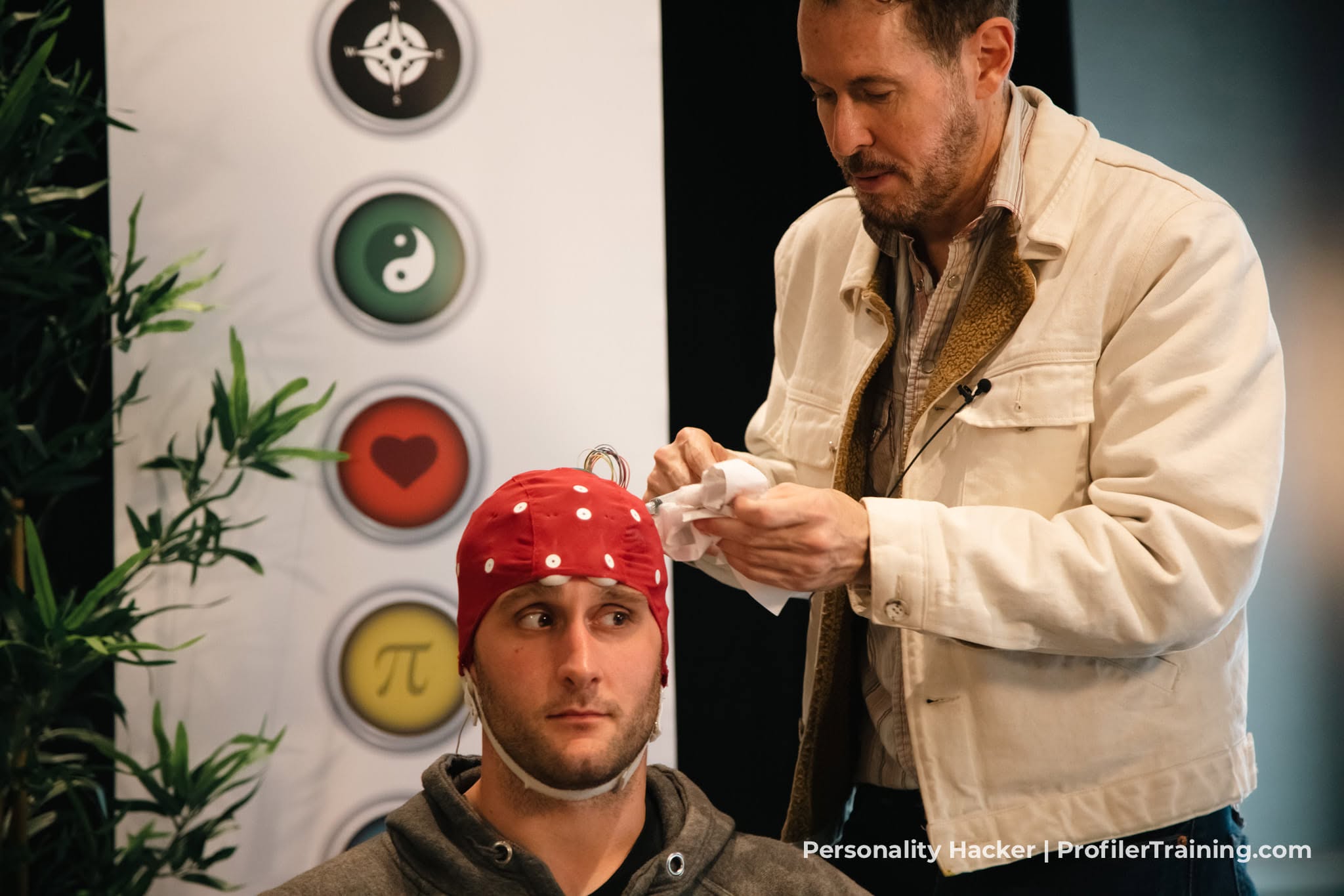 An EEG brain-imaging session using a red sensor cap